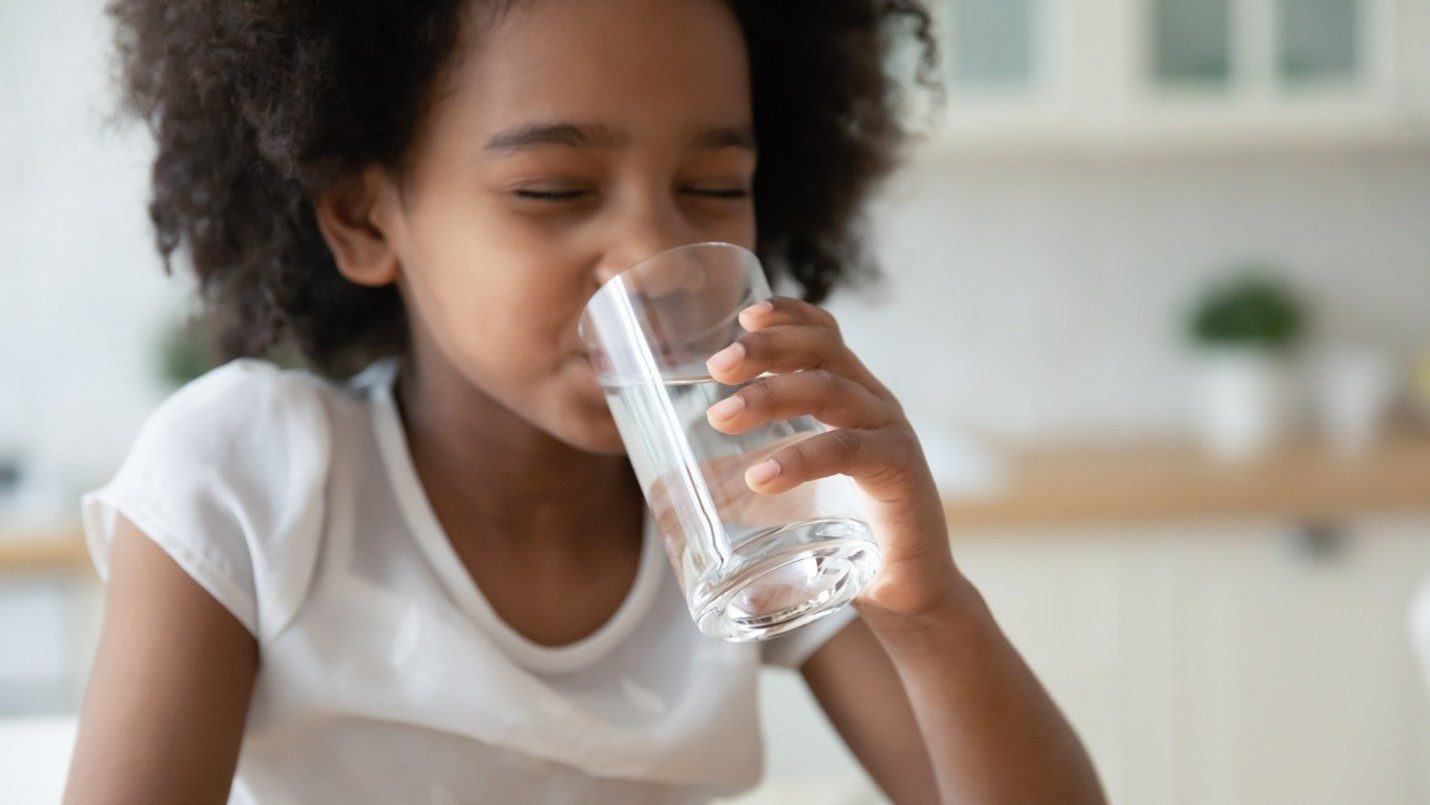 little girl drinking