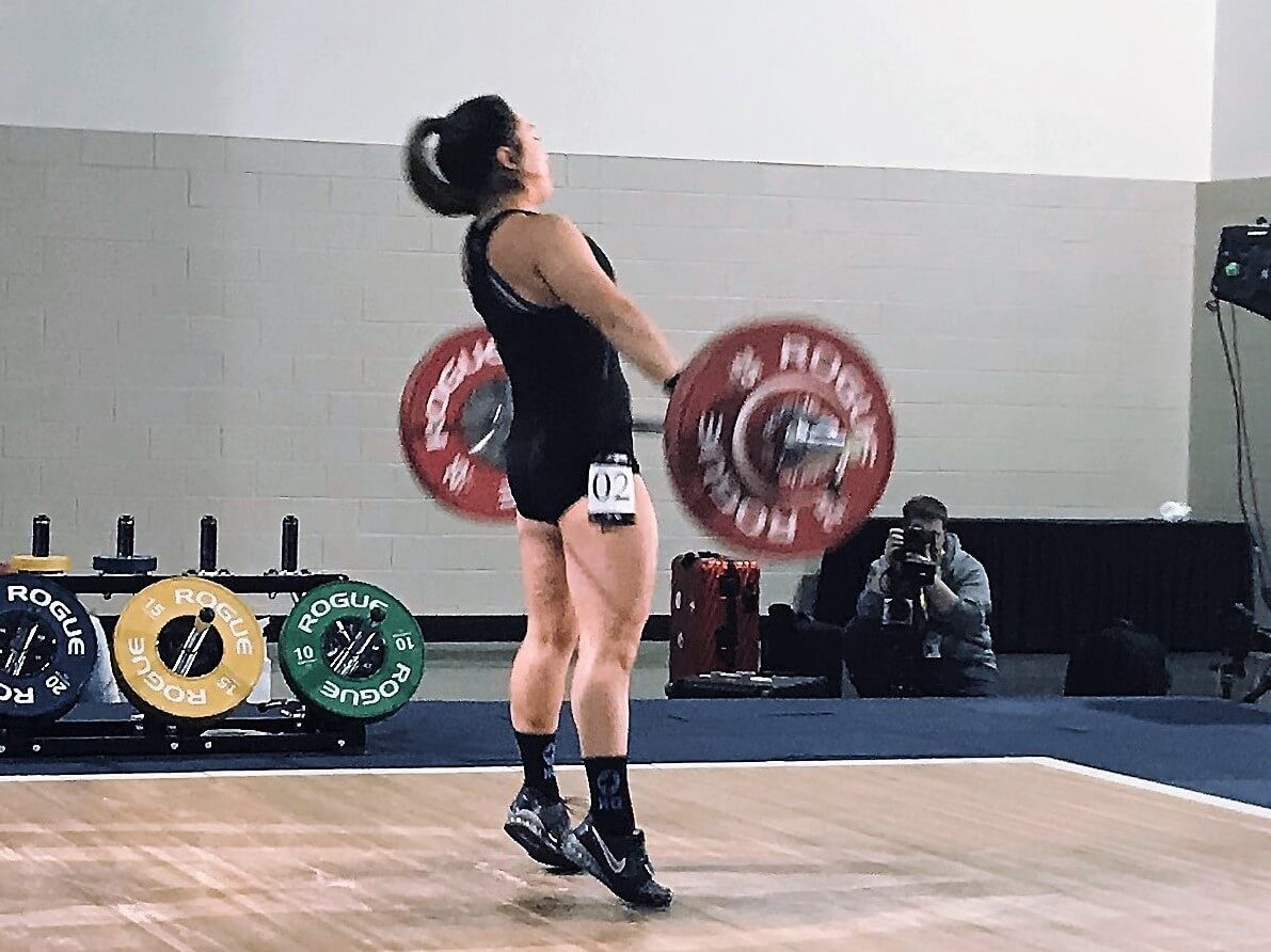 woman lifting weights
